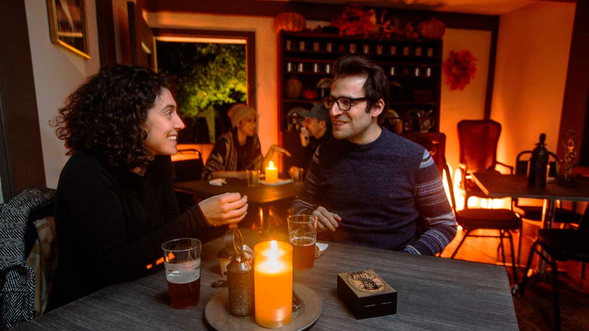 Gourd & Goblet Tavern Interior Woman and Man at Gourd & Goblet Tavern